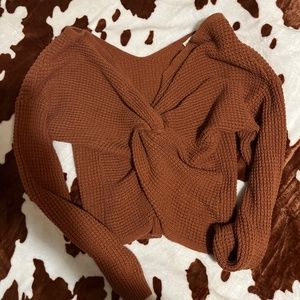 Cute cross up sweater!